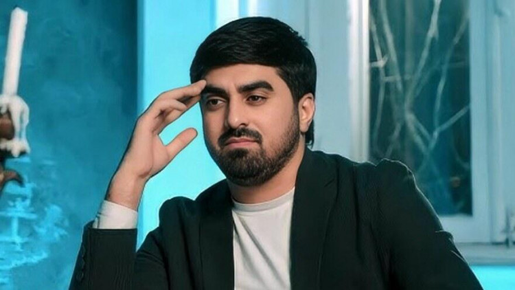 Atasının doğum gününü məzarı üstündə qeyd etdi - VİDEO