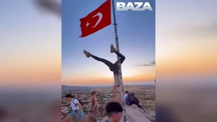 Bayraq dirəyinin üzərinə çıxıb rəqs etdi - HƏBS OLUNACAQ - VİDEO