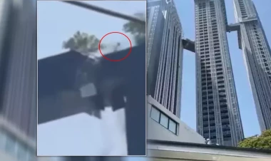 Qəhrəman ata zəlzələ zamanı bir göydələndən digərinə tullanaraq ailəsini xilas etdi - ANBAAN VİDEO