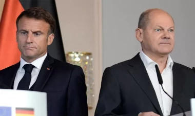 Makronla Şolts arasında fikir ayrılığı düşmənçiliyə çevrilir