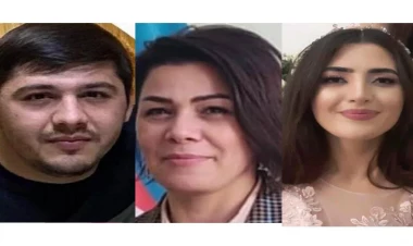 Qapı gözlüyündən videonu çəkən qadın: 