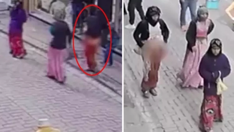 Oğru qadın küçədə tanınmamaq üçün biabırçı yola əl atdı - ANBAAN KAMERADA