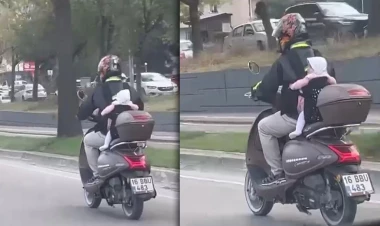 Motosikletli ana görənlərin ürəyini ağzına gətirdi - VİDEO