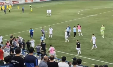 Polis futbol zamanı meydana girən azarkeşi vurub? - VİDEO