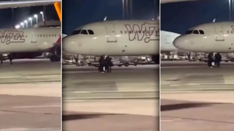Əl yelləyib təyyarəni saxlatmaq istədilər - VİDEO
